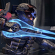 A Spartan wearing a skull helmet wields an energy sword in Halo Infinite.